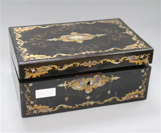 An inlaid mother of pearl papier mache writing box